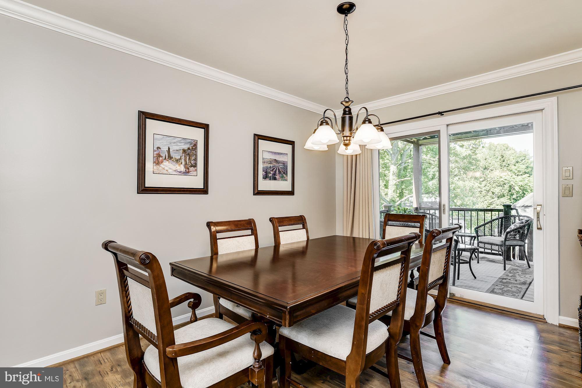 3069 Riverview Road Riva, MD 21140 - Photo 7 of 38 a dining room with furniture window and wooden floor