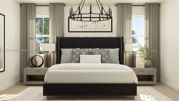 a bedroom with a bed a mirror and a window