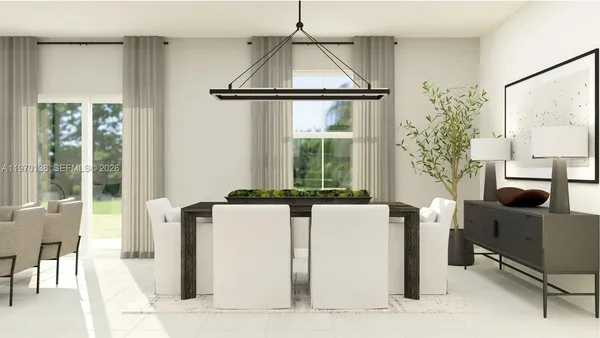 a view of a dining room with furniture and a window