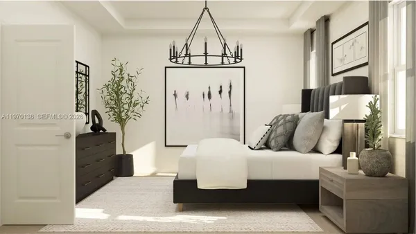 a bedroom with a bed and a couch