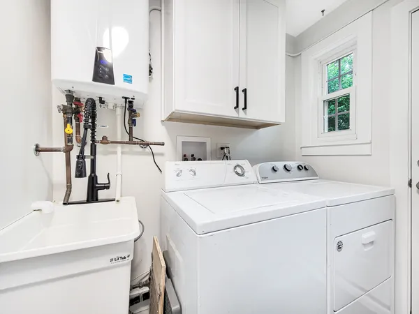 a utility room with dryer and washer