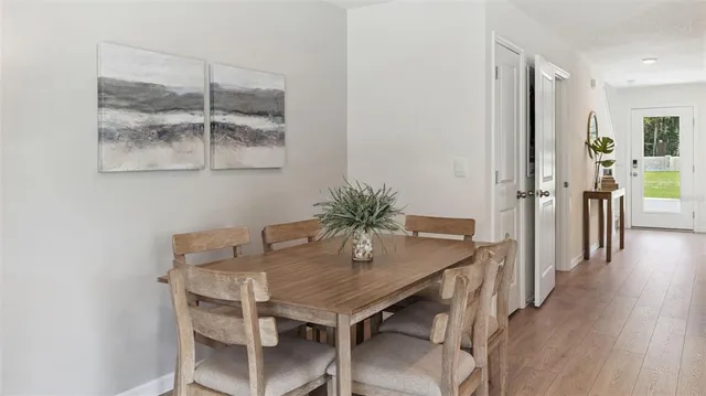 a view of a dining room with furniture