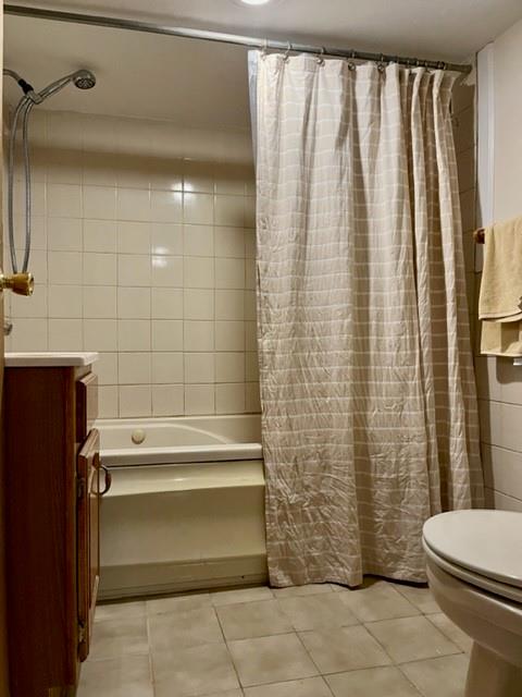 1717 East 37th Street Brooklyn, NY 11234 - Photo 10 of 12 a bathroom with a toilet and shower