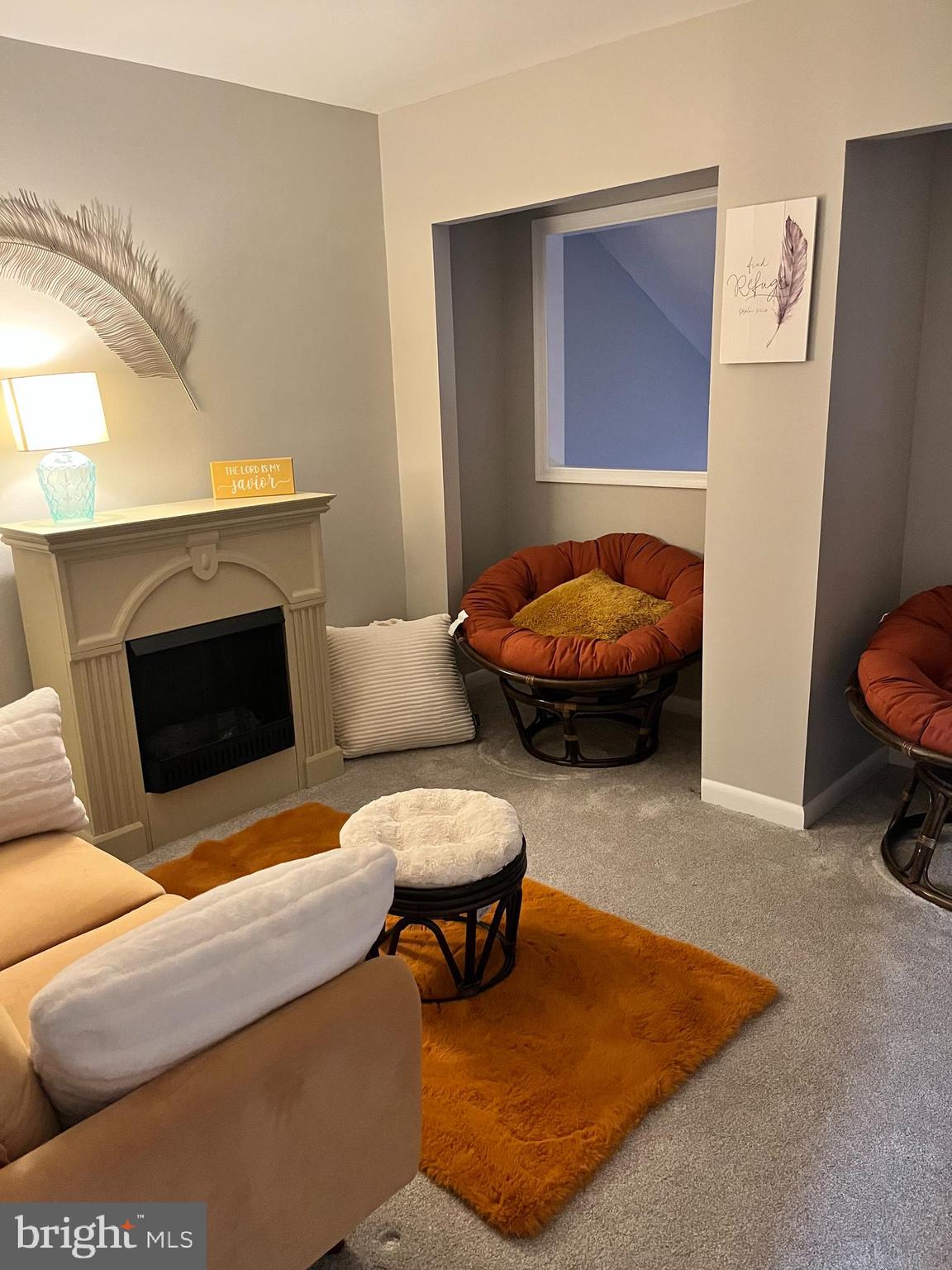 3435 Albantowne Way Edgewood, MD 21040 - Photo 15 of 24 a living room with furniture and a fireplace