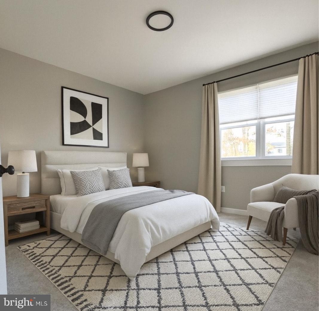 3435 Albantowne Way Edgewood, MD 21040 - Photo 17 of 24 a bedroom with a bed and window