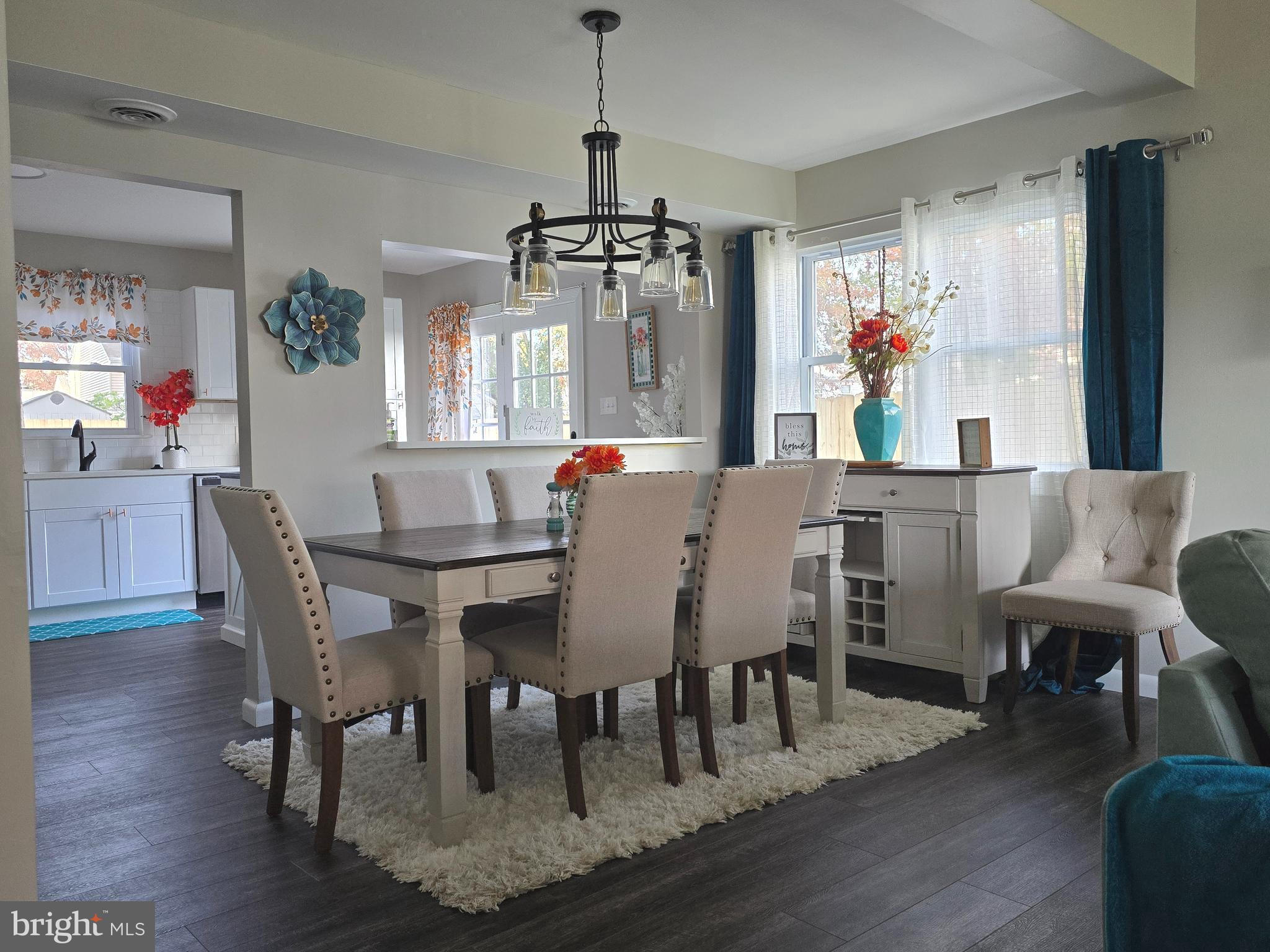 3435 Albantowne Way Edgewood, MD 21040 - Photo 4 of 24 a view of a dining room with furniture wooden floor and chandelier
