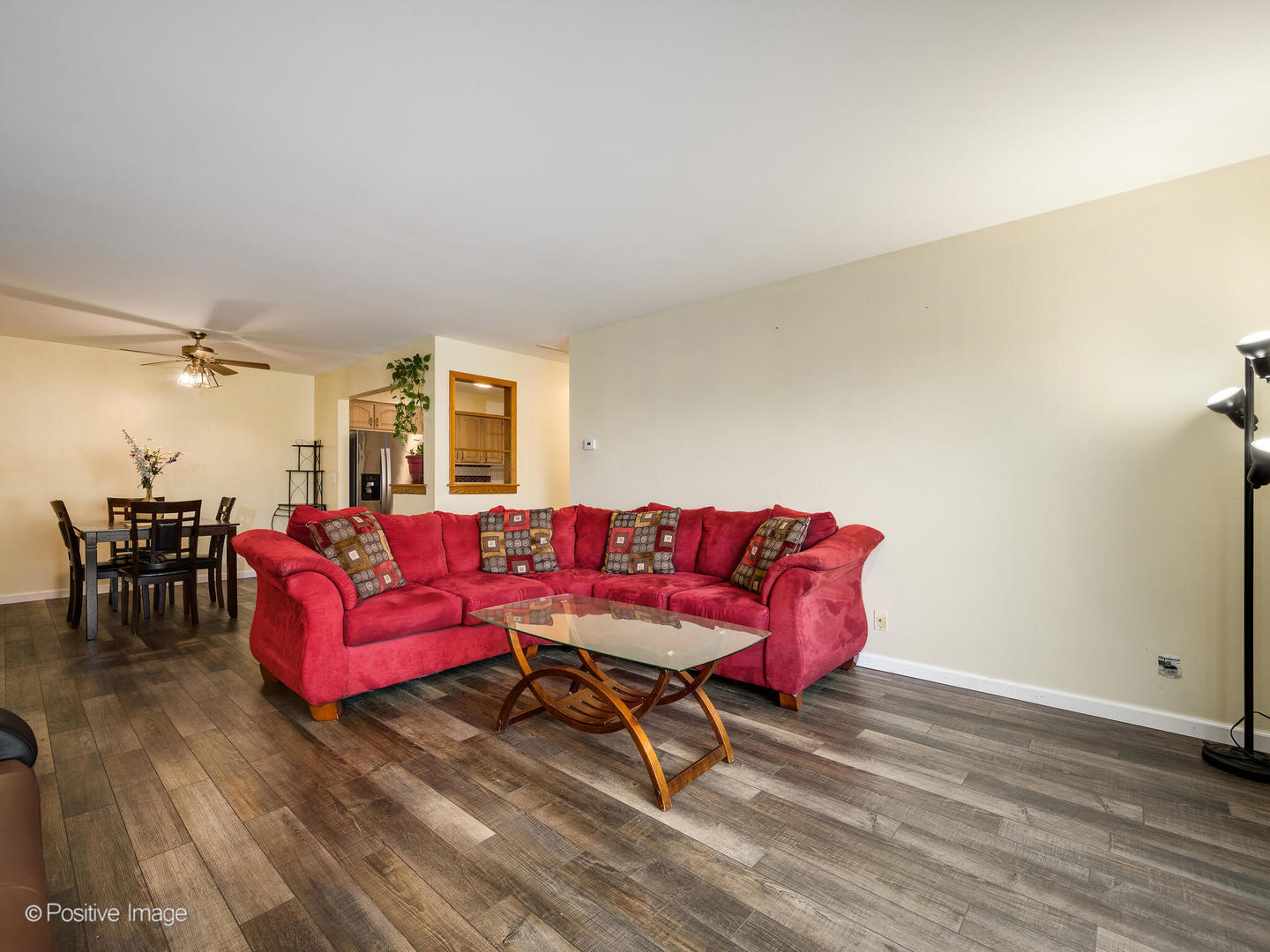 1322 South New Wilke Road, Unit 1C Arlington Heights, IL 60005 - Photo 11 of 20 a living room with furniture and a wooden floor