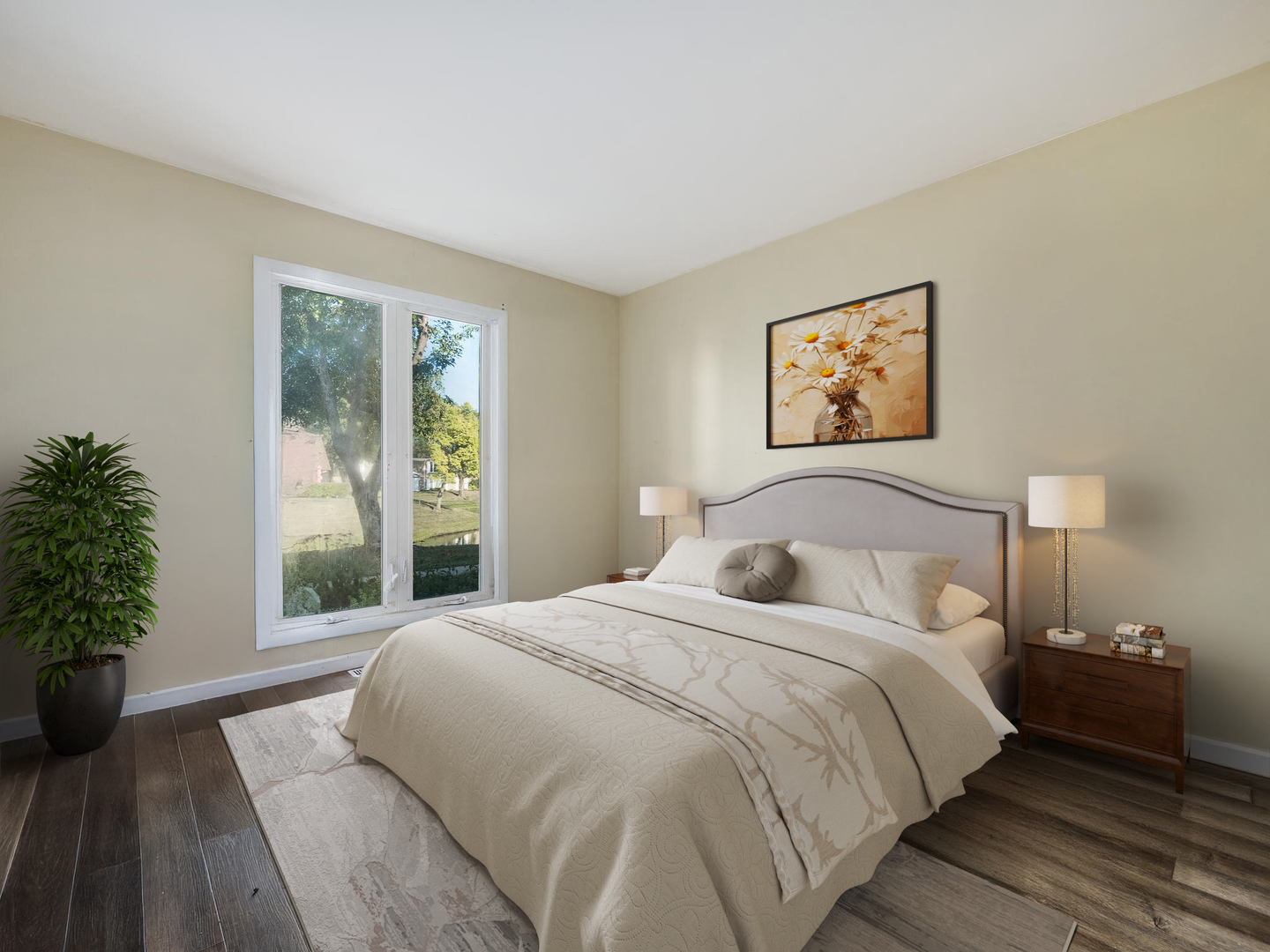 1322 South New Wilke Road, Unit 1C Arlington Heights, IL 60005 - Photo 16 of 20 a bedroom with a large bed and a potted plant