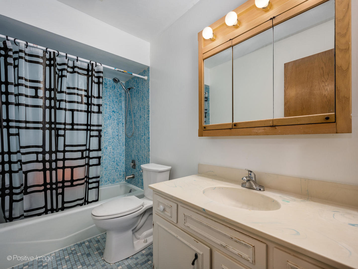 1322 South New Wilke Road, Unit 1C Arlington Heights, IL 60005 - Photo 17 of 20 a bathroom with a sink toilet and shower