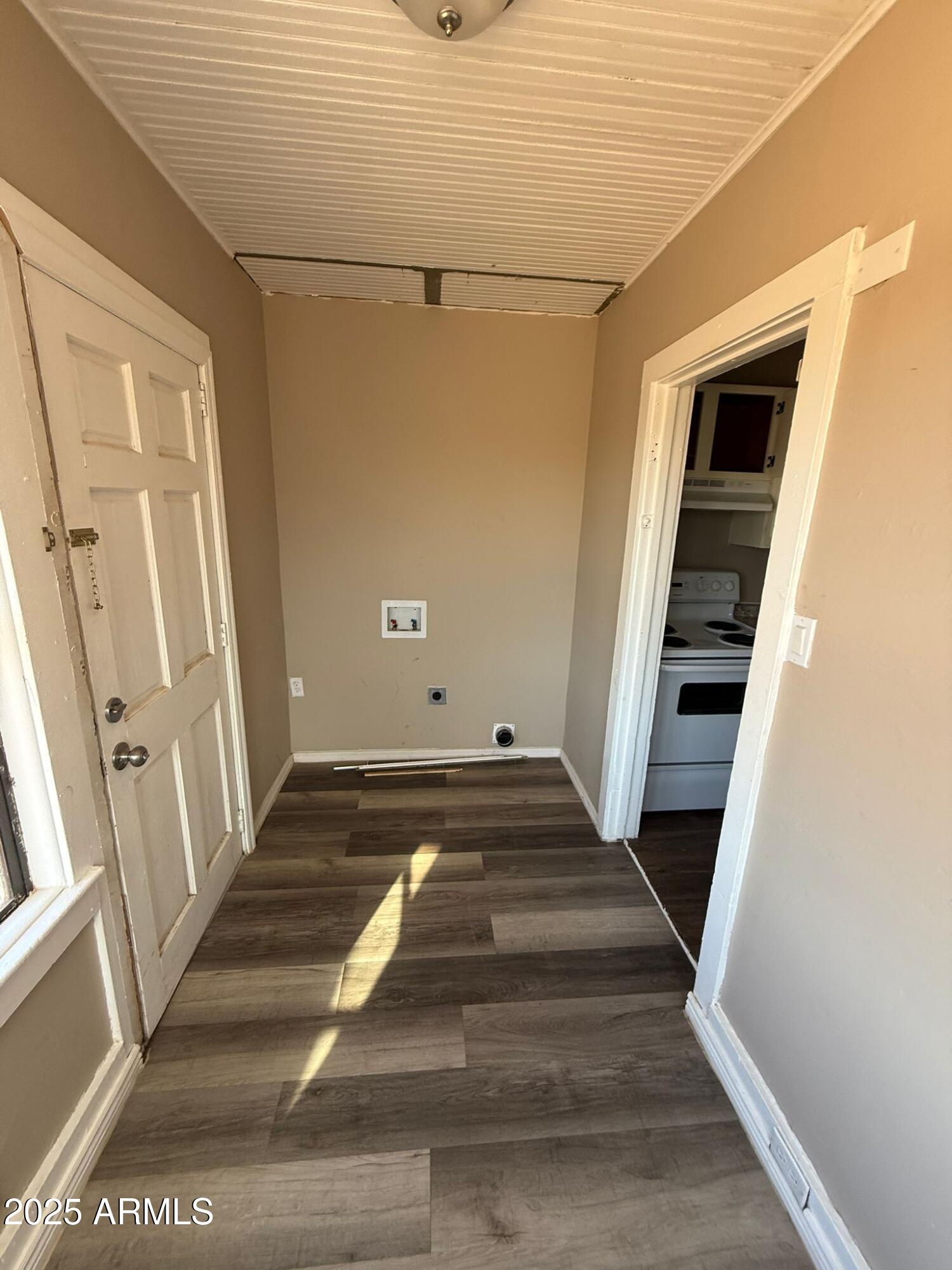 2082 North Cougar Place Douglas, AZ 85607 - Photo 8 of 16 a view of staircase with white walls and a window