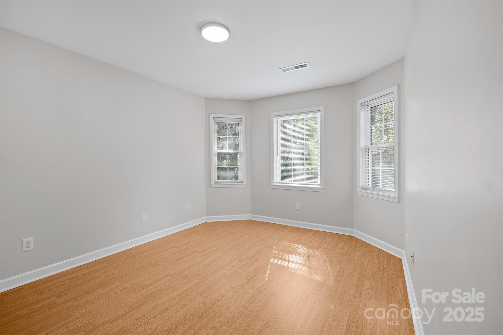 3024 Cross Tie Lane Matthews, NC 28105 - Photo 12 of 30 an empty room with windows