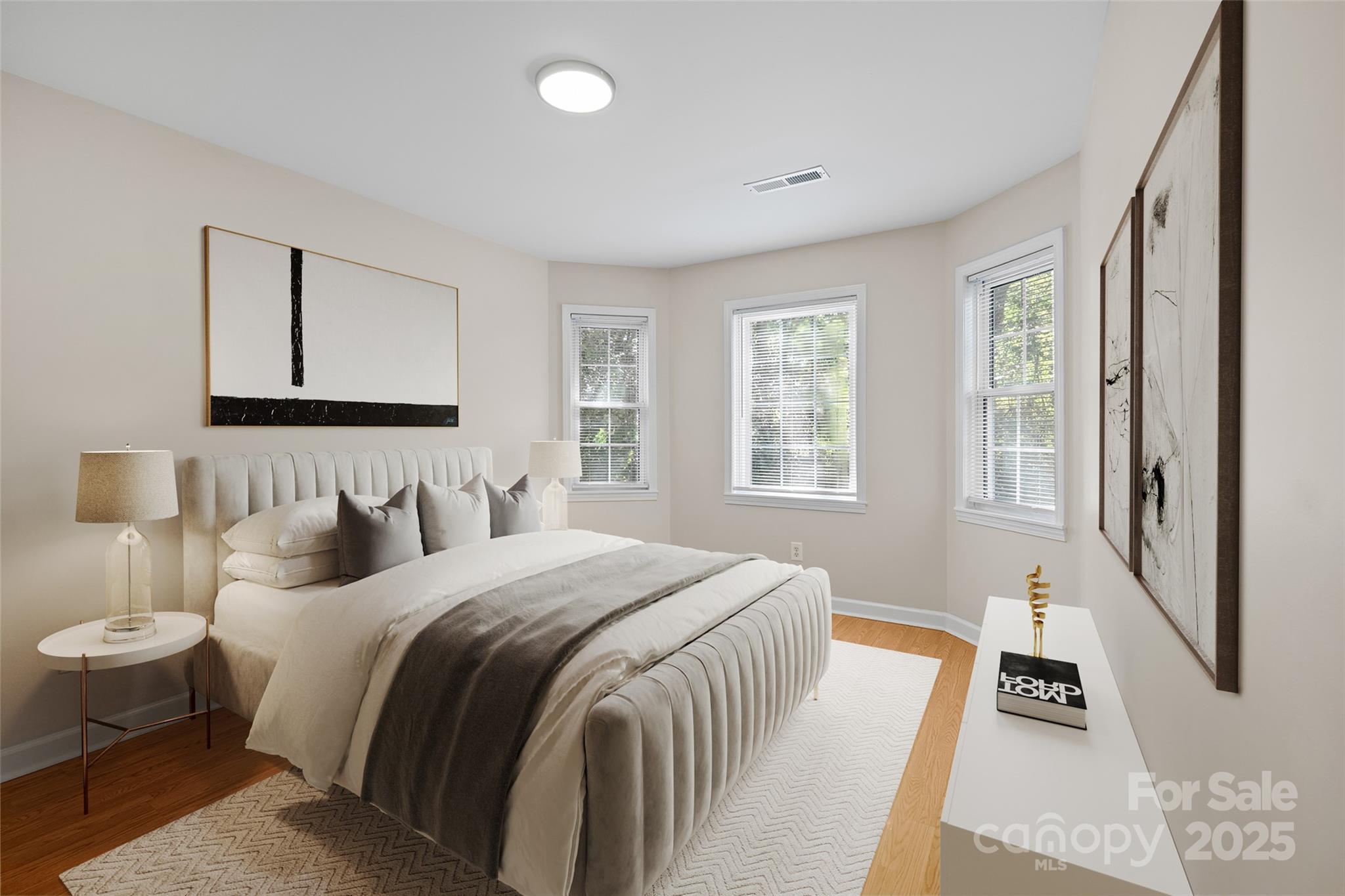 3024 Cross Tie Lane Matthews, NC 28105 - Photo 13 of 30 a bedroom with a bed and a large window