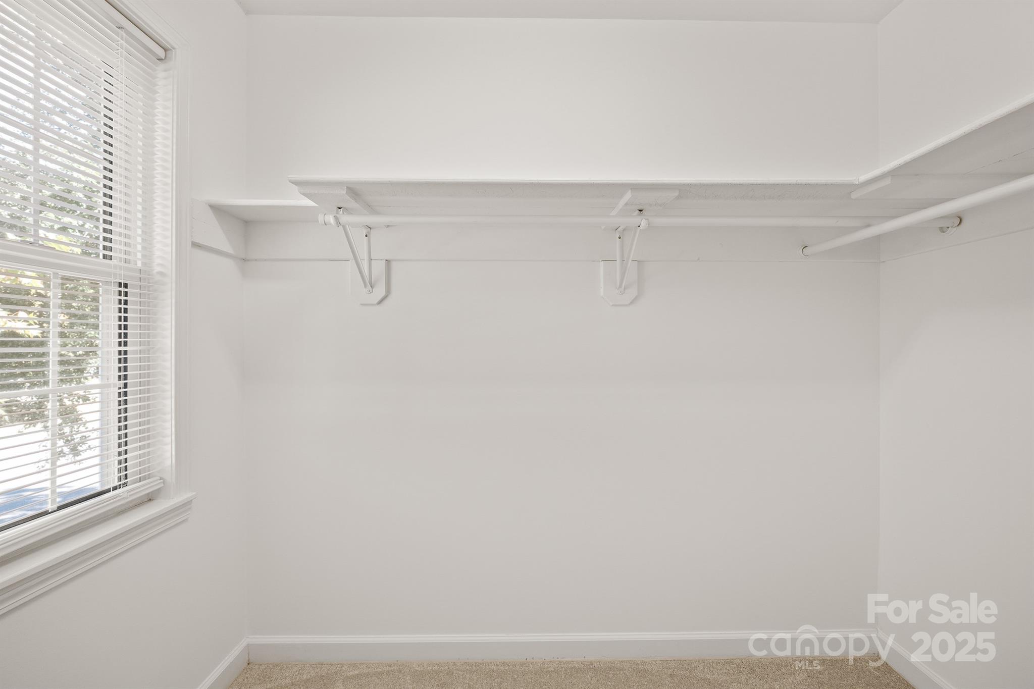 3024 Cross Tie Lane Matthews, NC 28105 - Photo 20 of 30 a view of a closet in a room