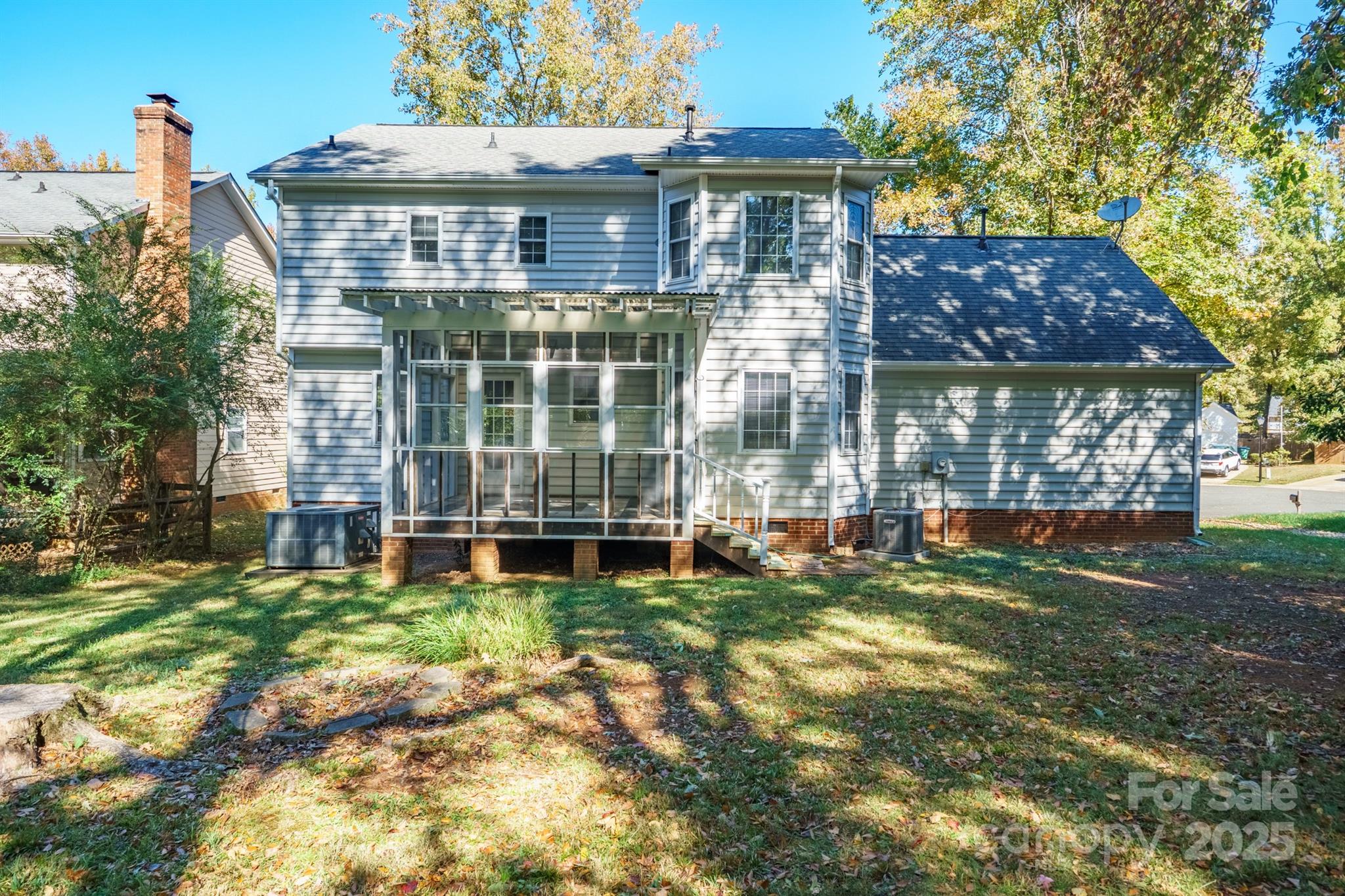 3024 Cross Tie Lane Matthews, NC 28105 - Photo 25 of 30 a front view of a house with a yard