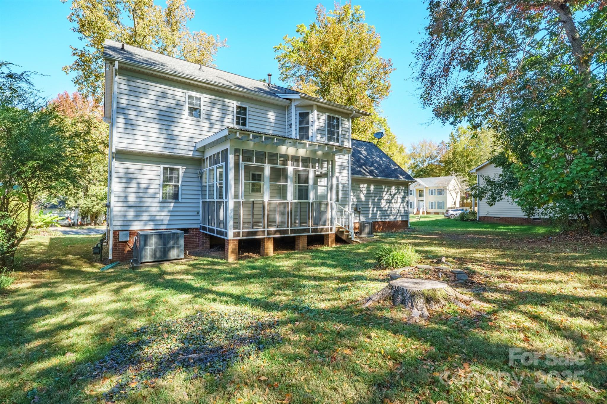 3024 Cross Tie Lane Matthews, NC 28105 - Photo 26 of 30 a view of a house with a yard
