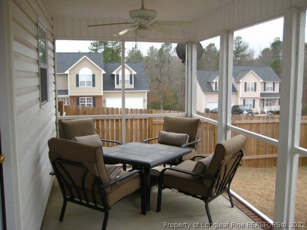 106 Pender Road Spring Lake, NC 28390 - Photo 2 of 3 a view of a chairs and table in a patio