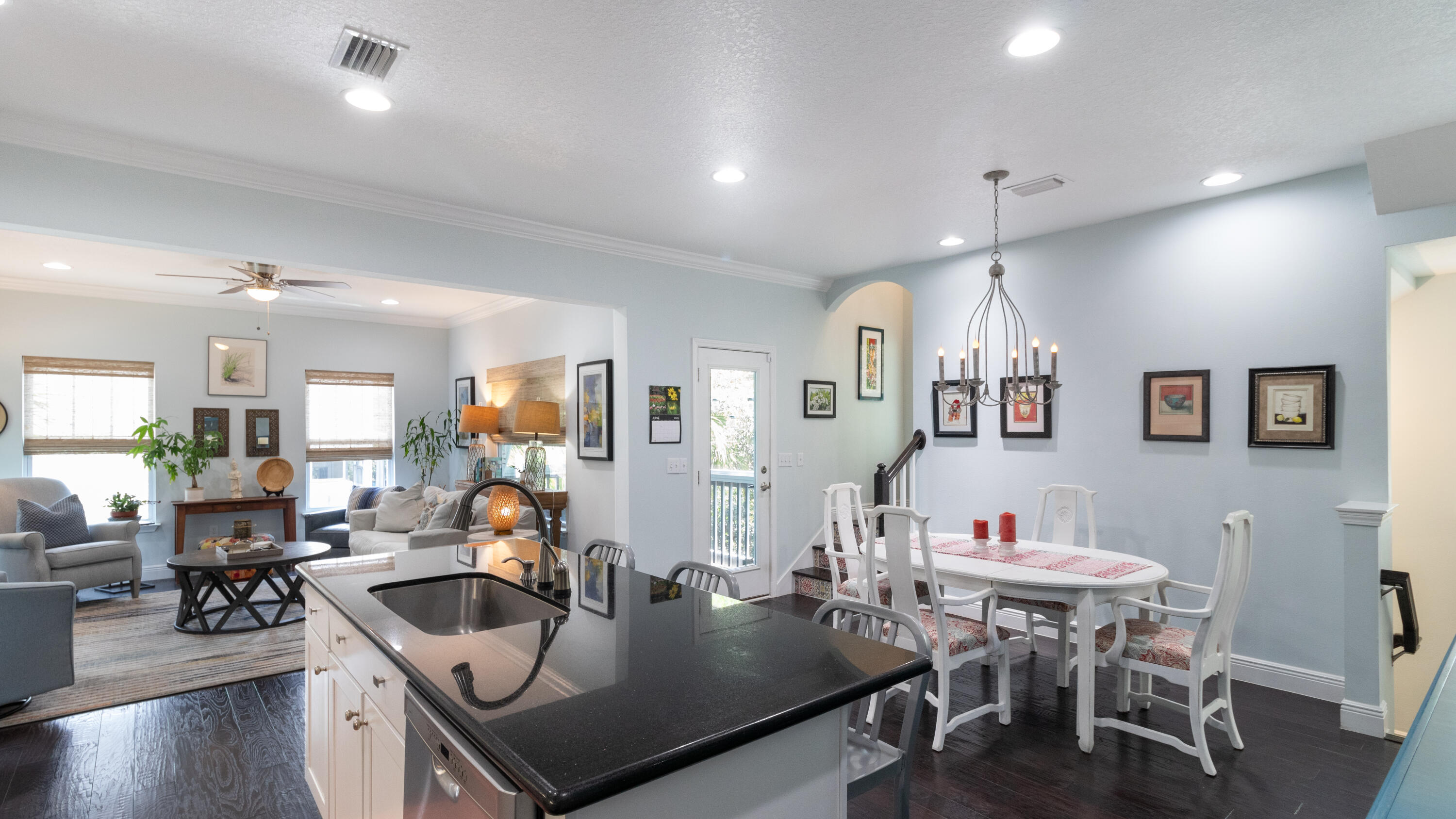 146 Sandpine Loop Inlet Beach, FL 32461 - Photo 16 of 50 a kitchen with a dining table chairs and living room