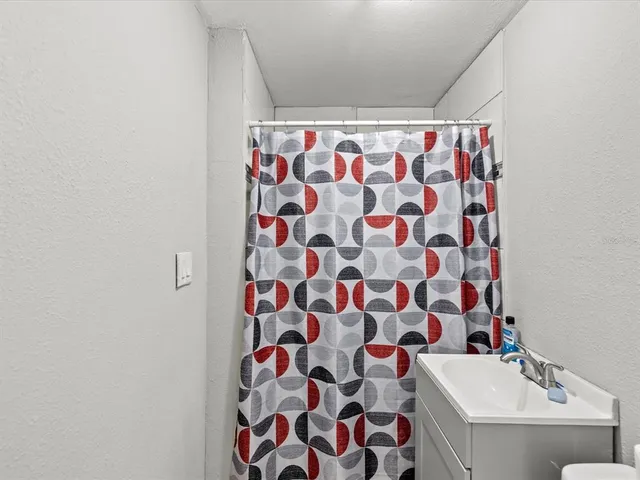 a bathroom with a sink and a bathtub