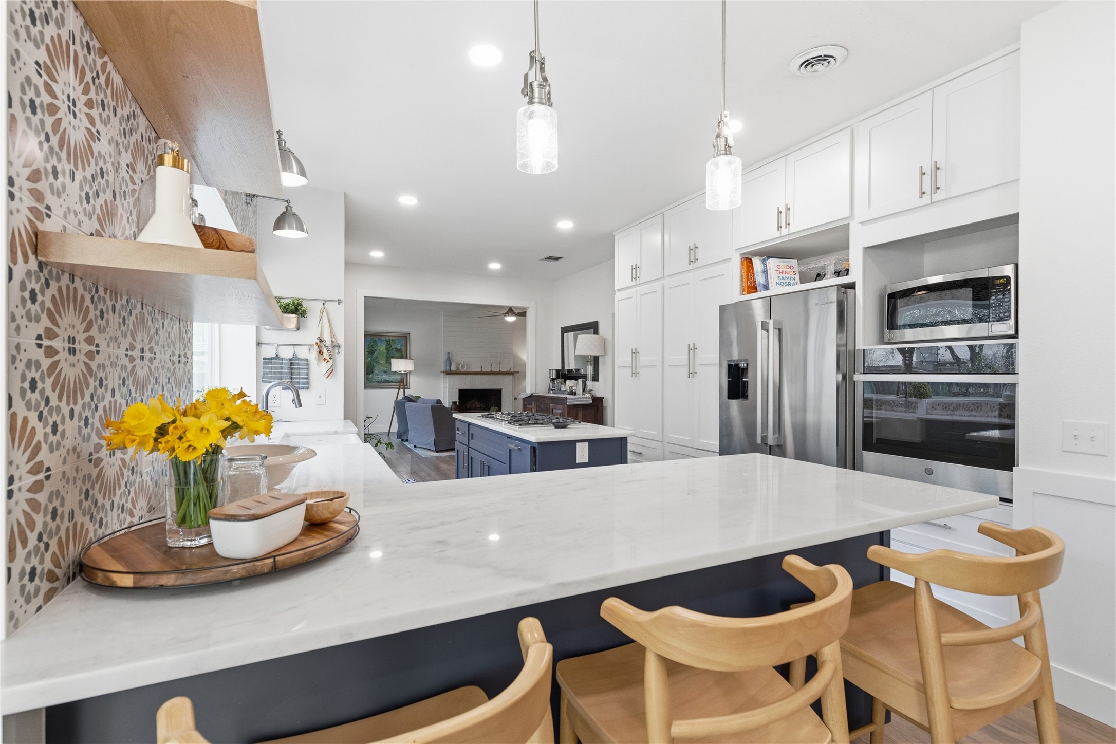 6310 Walebridge Lane Austin, TX 78739 - Photo 15 of 40 Pull up a chair! Welcome home! Who wants a glass of wine?