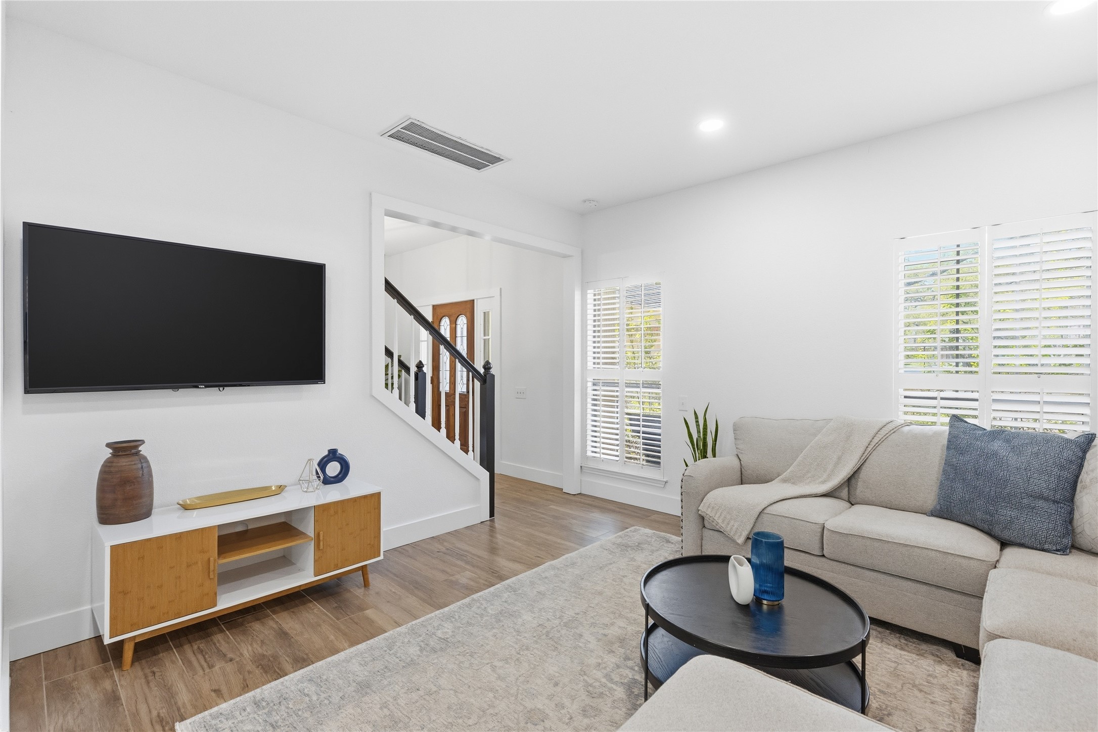 6310 Walebridge Lane Austin, TX 78739 - Photo 35 of 40 Living room featuring light wood-style floors and recessed lighting