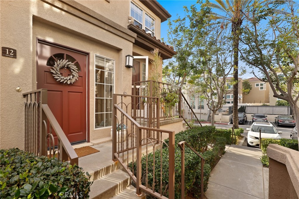12 Montana Del Lago Drive, Unit 168 Rancho Santa Margarita, CA 92688 - Photo 23 of 23 a building outdoor space with lots of trees