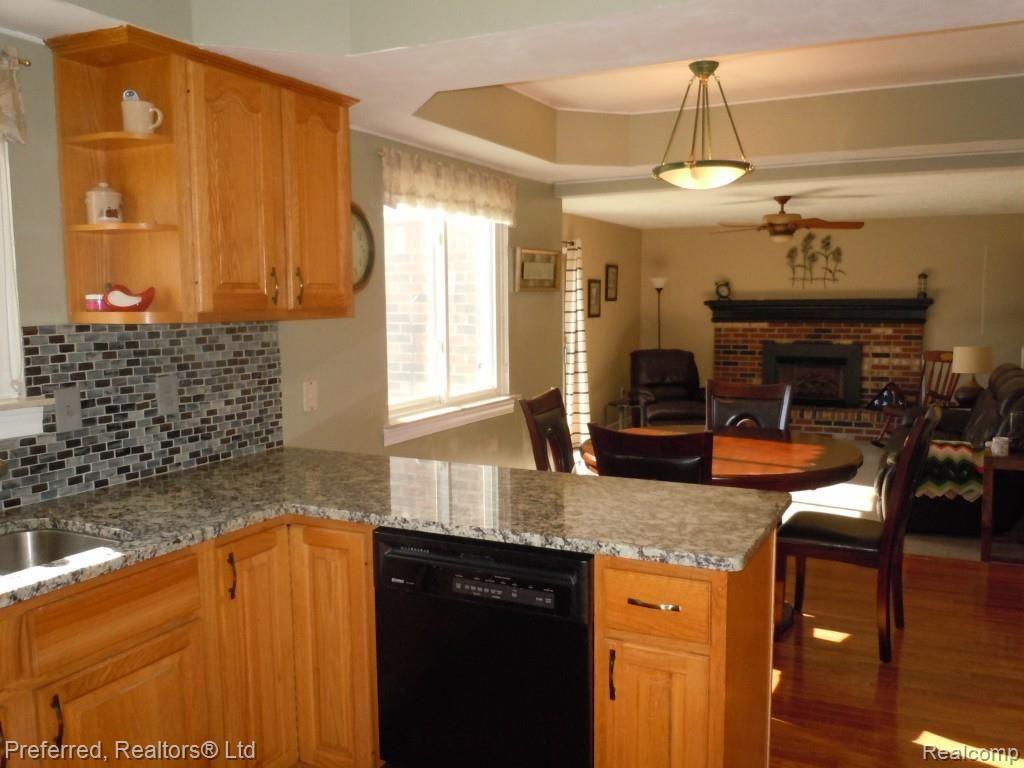 8334 Mannington Road Canton, MI 48187 - Photo 13 of 26 VIEW FROM KITCHEN TO FAMILY ROOM