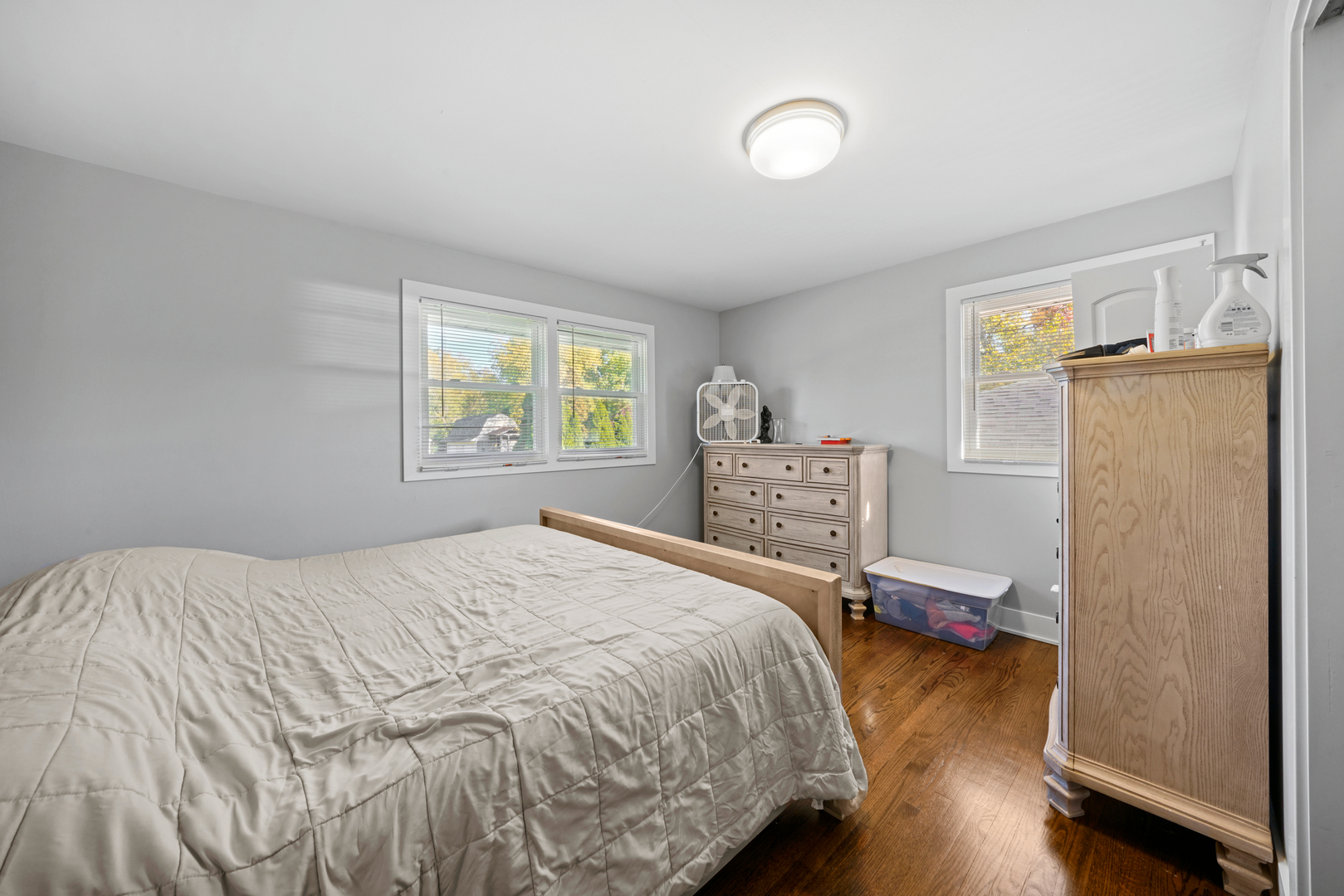 8620 Wolf Road Willow Springs, IL 60480 - Photo 19 of 32 a bedroom with a bed and a window