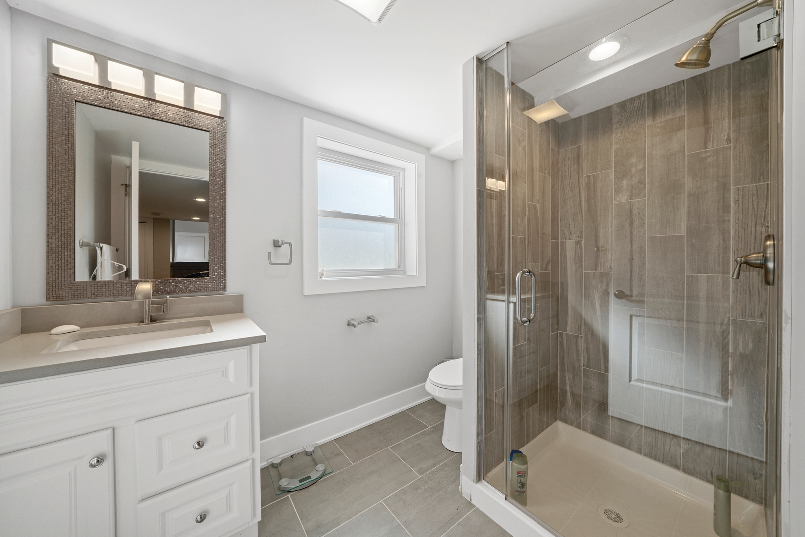 8620 Wolf Road Willow Springs, IL 60480 - Photo 21 of 32 a bathroom with a sink a toilet and shower
