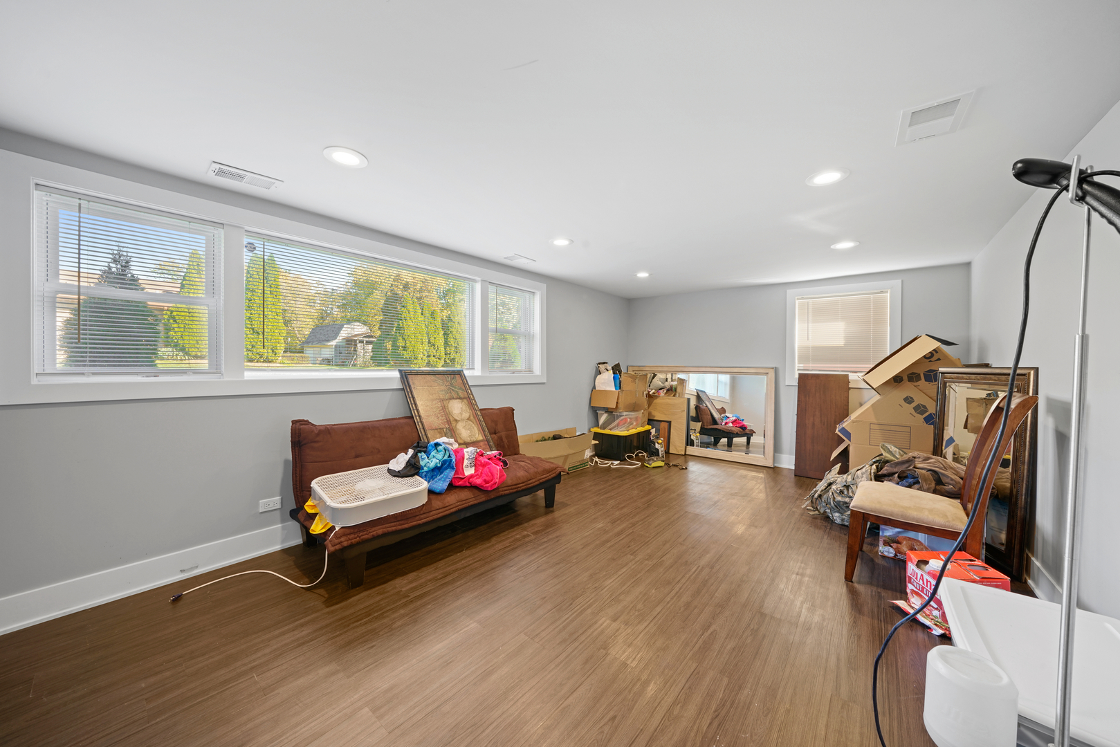 8620 Wolf Road Willow Springs, IL 60480 - Photo 23 of 32 a bedroom with furniture and a window