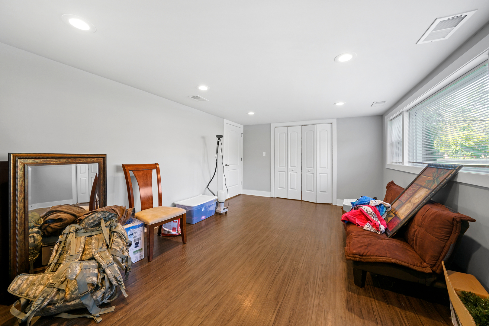 8620 Wolf Road Willow Springs, IL 60480 - Photo 24 of 32 a living room with furniture or window and a wooden floor