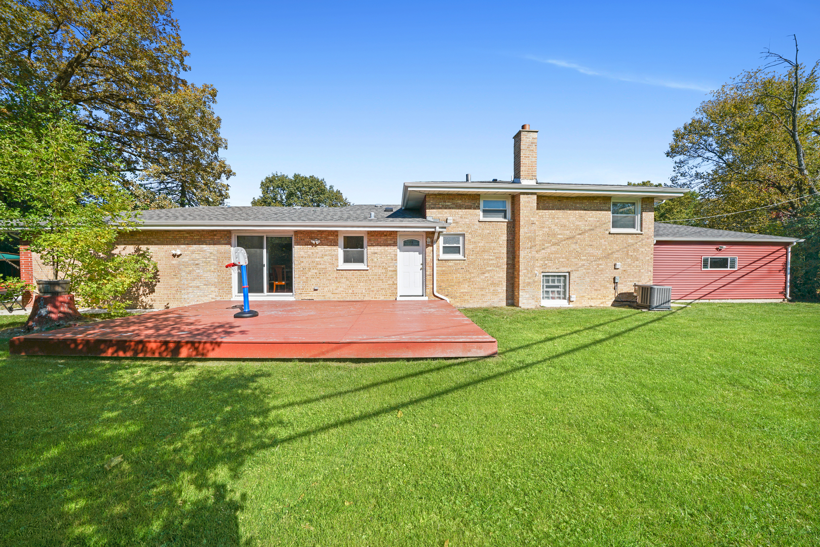 8620 Wolf Road Willow Springs, IL 60480 - Photo 29 of 32 a view of a house with a yard and sitting area