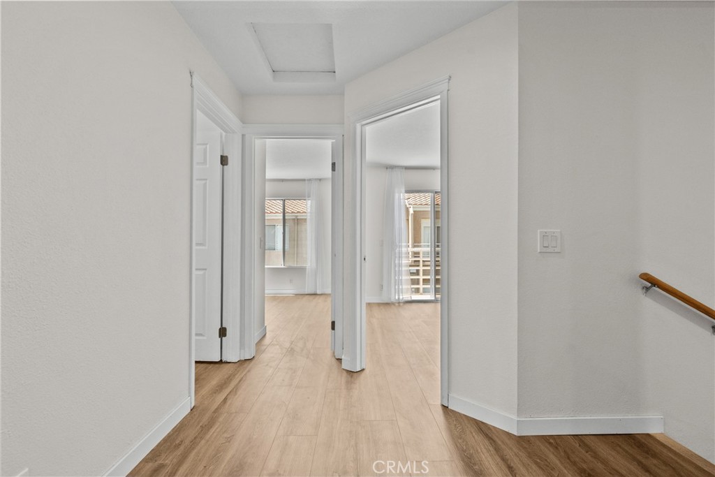 25511 Schubert Circle, Unit 142B Stevenson Ranch, CA 91381 - Photo 24 of 47 Hallway to secondary bedrooms