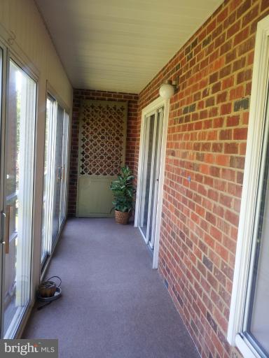 15100 Glade Drive, Unit 112E Silver Spring, MD 20906 - Photo 7 of 25 a view of entryway with stairs