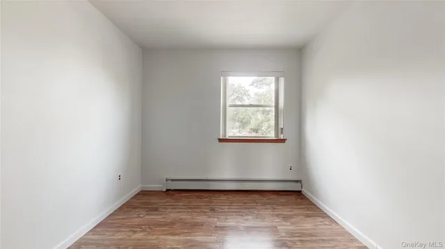 an empty room with window