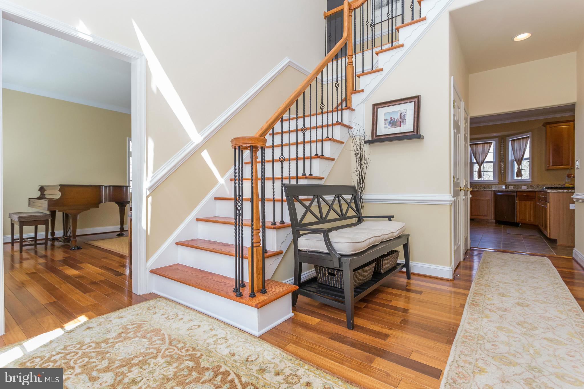 82 Millbrook Road Stafford, VA 22554 - Photo 3 of 30 Foyer/Hrdwd flrs & Stairs w/Wrought Iron Spindles