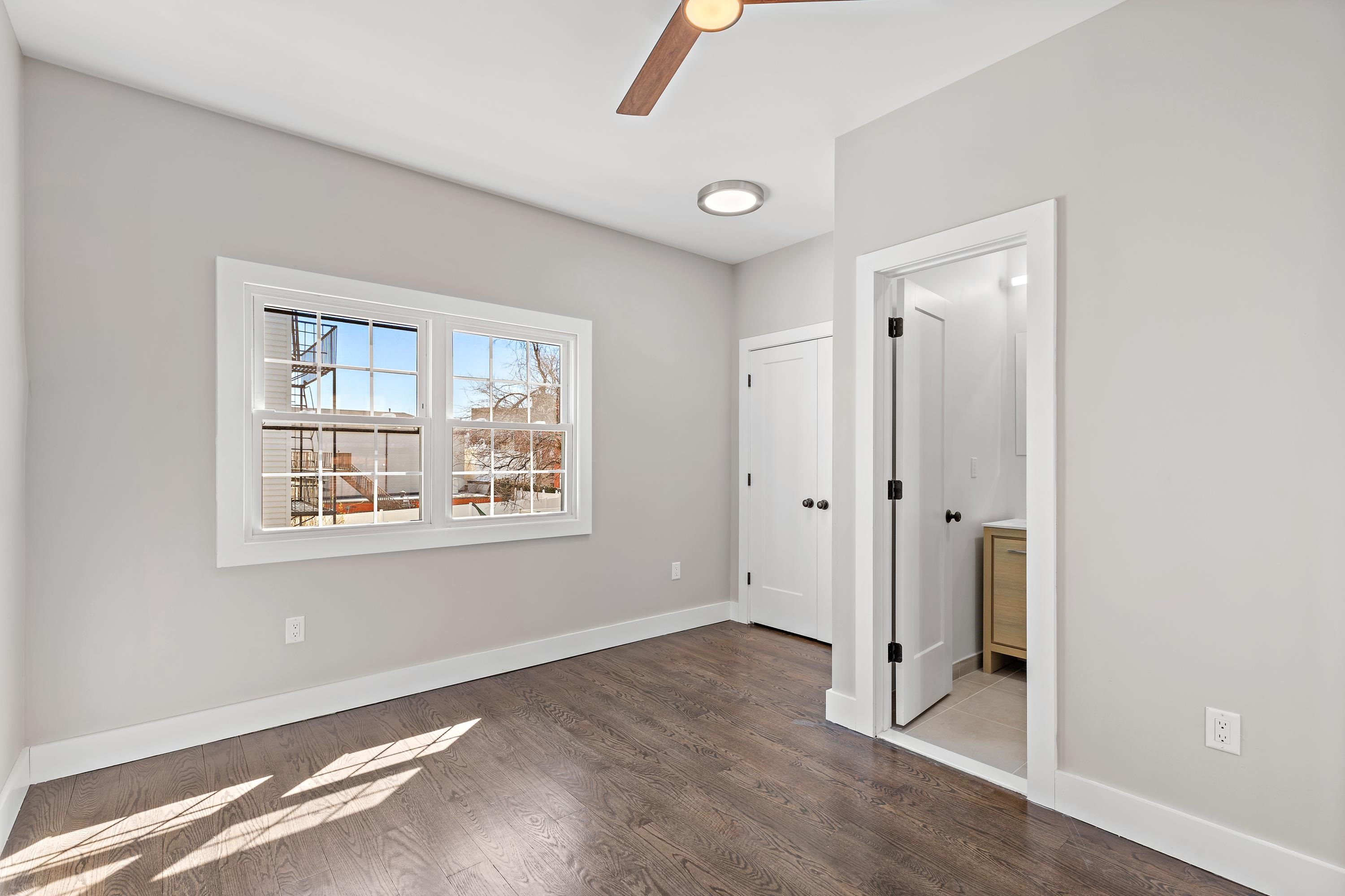189 Hackensack Plank Road Weehawken, NJ 07086 - Photo 14 of 46 a view of an empty room with a window