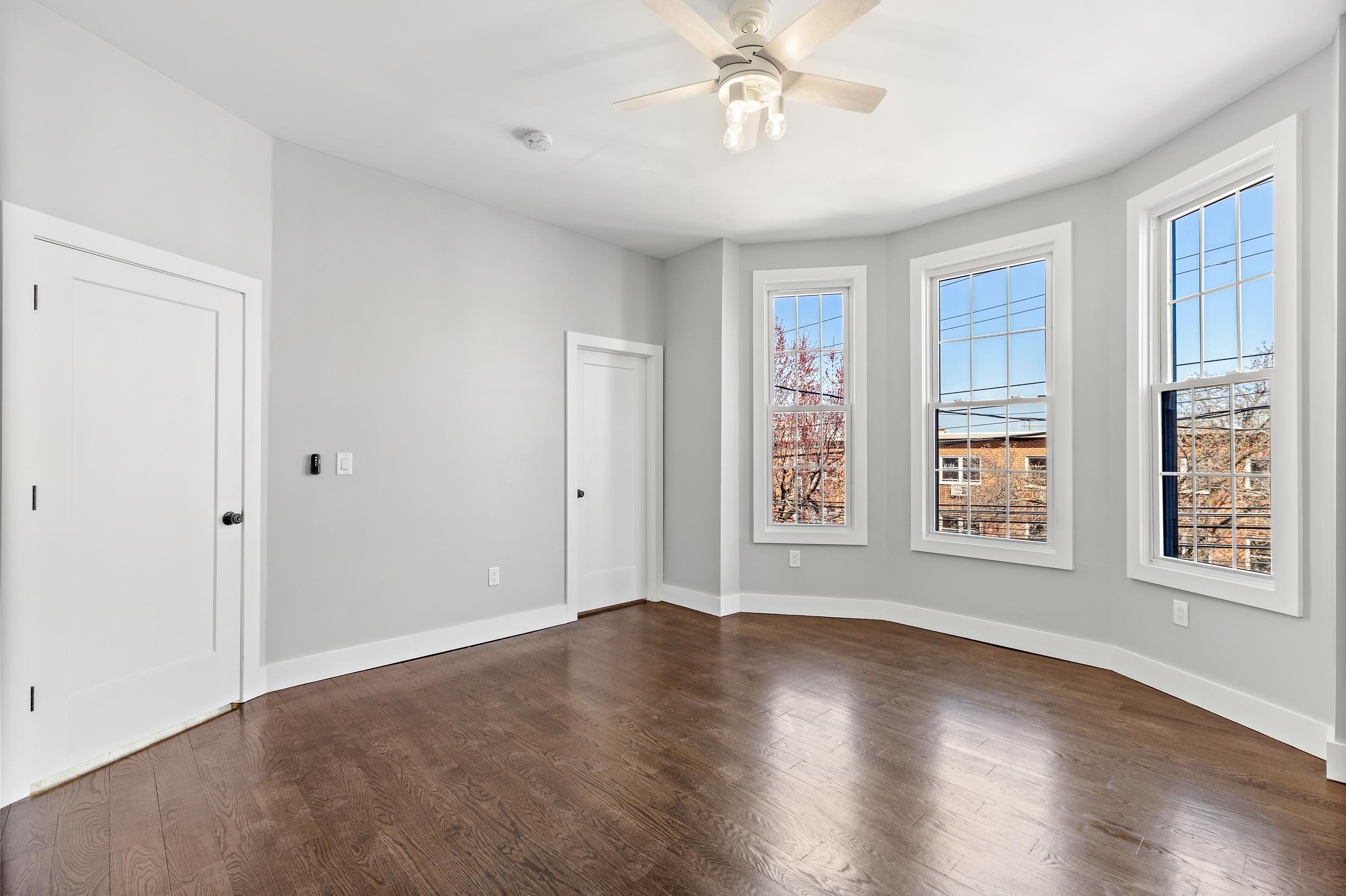 189 Hackensack Plank Road Weehawken, NJ 07086 - Photo 33 of 46 a view of livingroom with hardwood floor and window