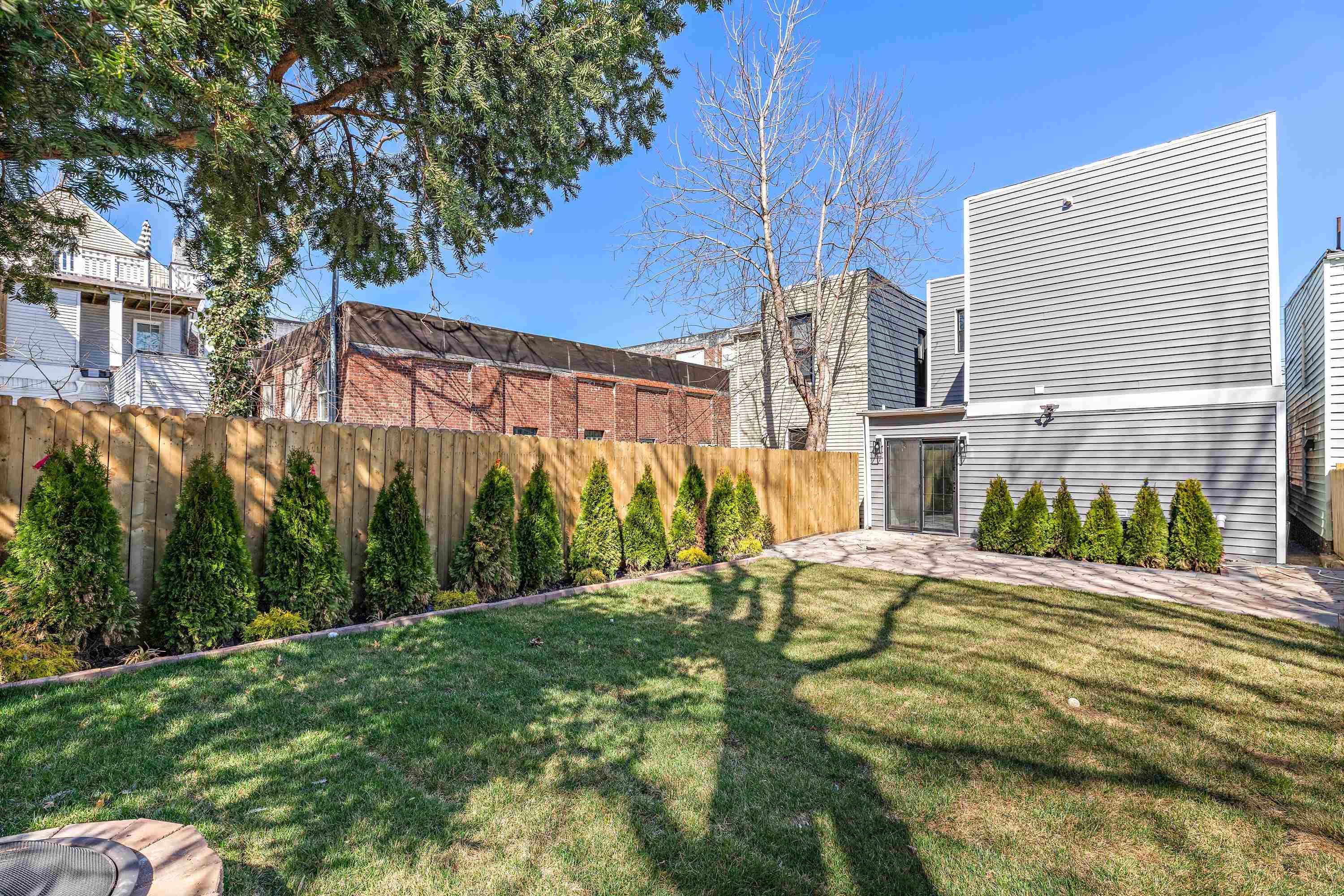 189 Hackensack Plank Road Weehawken, NJ 07086 - Photo 44 of 46 a view of backyard of house