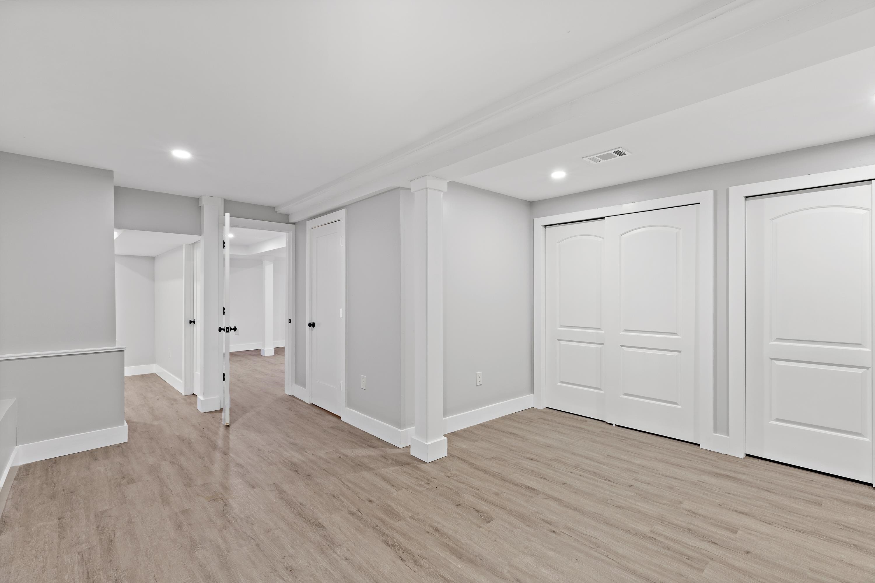 189 Hackensack Plank Road Weehawken, NJ 07086 - Photo 10 of 46 a view of empty room with wooden floor