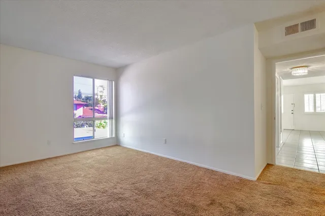 a view of room with racks on the wall