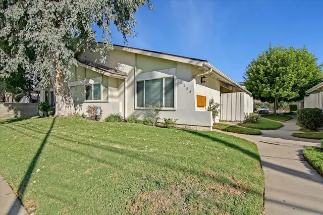 a car parked in front of a house