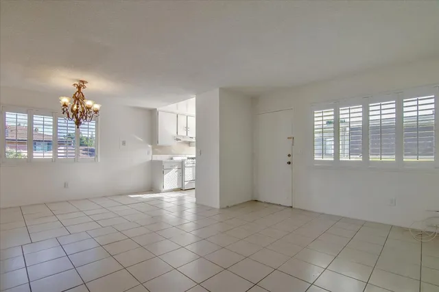 a view of a kitchen with a sink dishwasher and microwave