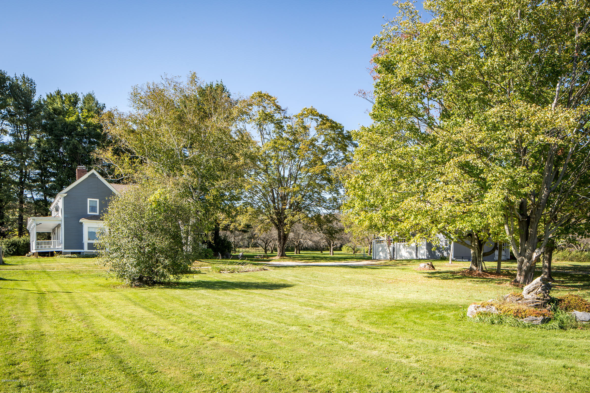492 State Road Richmond, MA 01201 - Photo 3 of 26 a view of swimming pool with an outdoor space and seating area