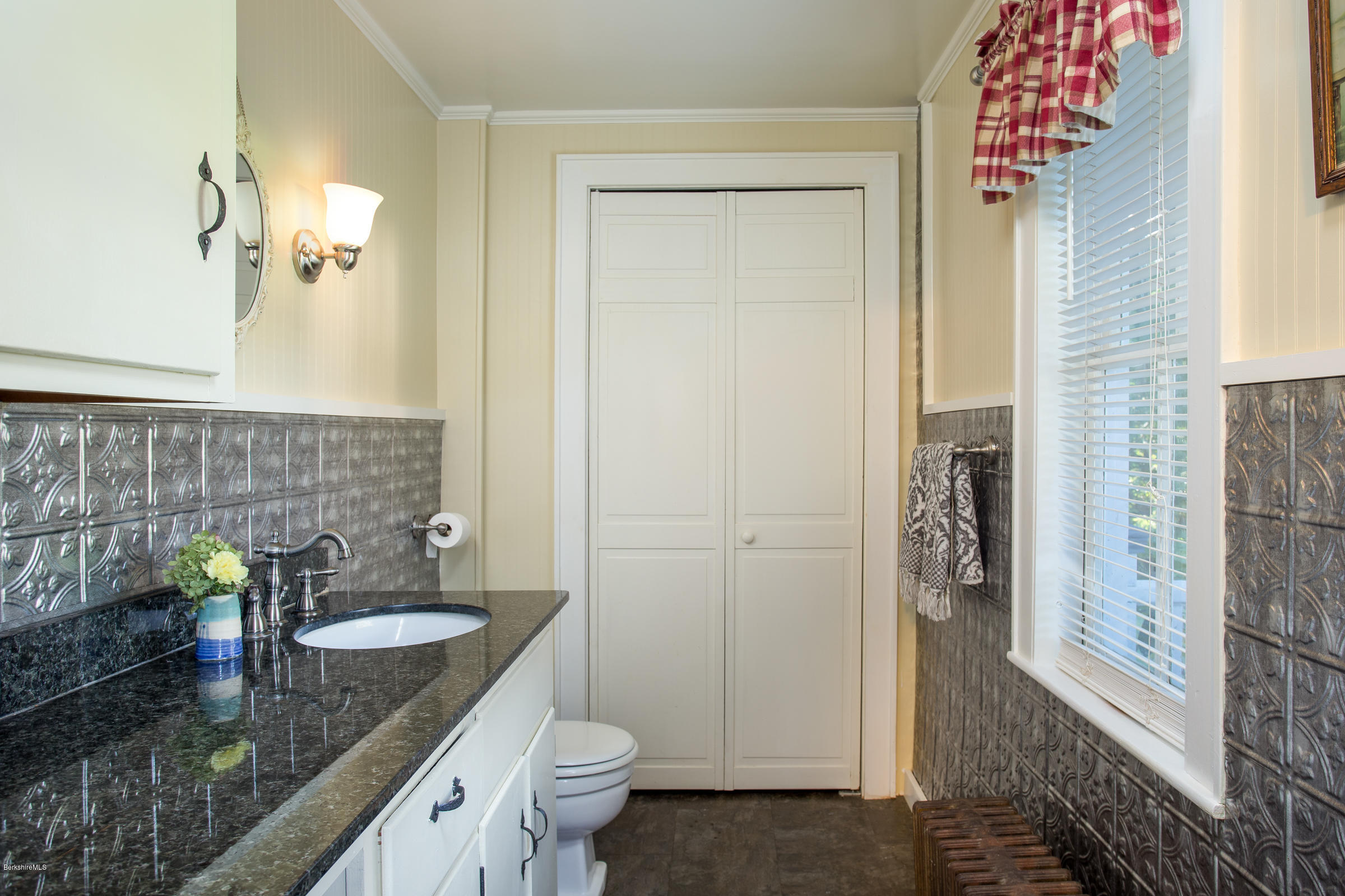 492 State Road Richmond, MA 01201 - Photo 22 of 26 a bathroom with a granite countertop sink a toilet and shower