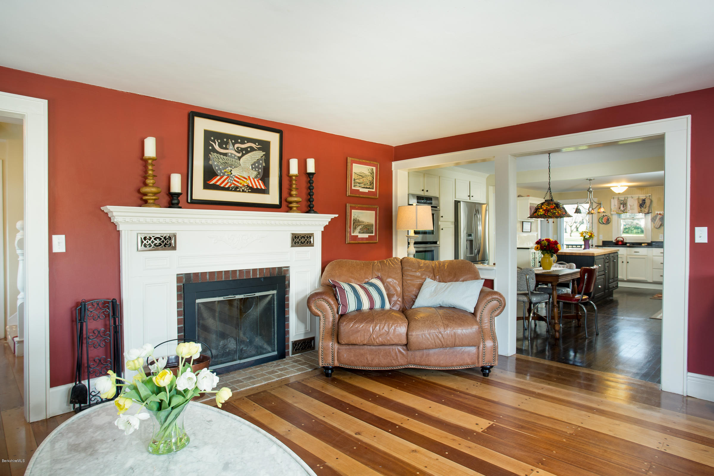 492 State Road Richmond, MA 01201 - Photo 8 of 26 a living room with furniture a fireplace and a table