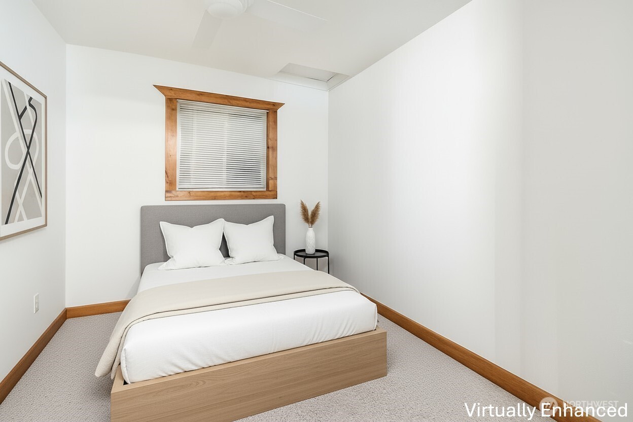 39217 Orville Road East Eatonville, WA 98328 - Photo 15 of 29 a bedroom with a bed and a window