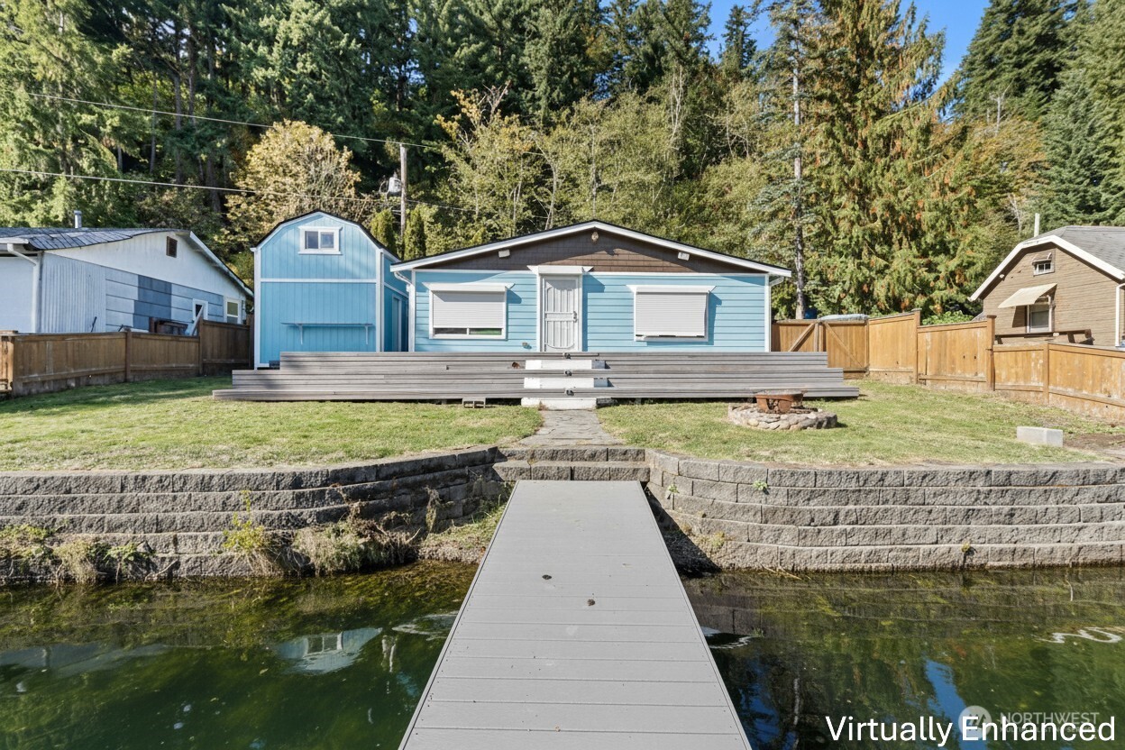 39217 Orville Road East Eatonville, WA 98328 - Photo 2 of 29 a swimming pool view with a outdoor seating