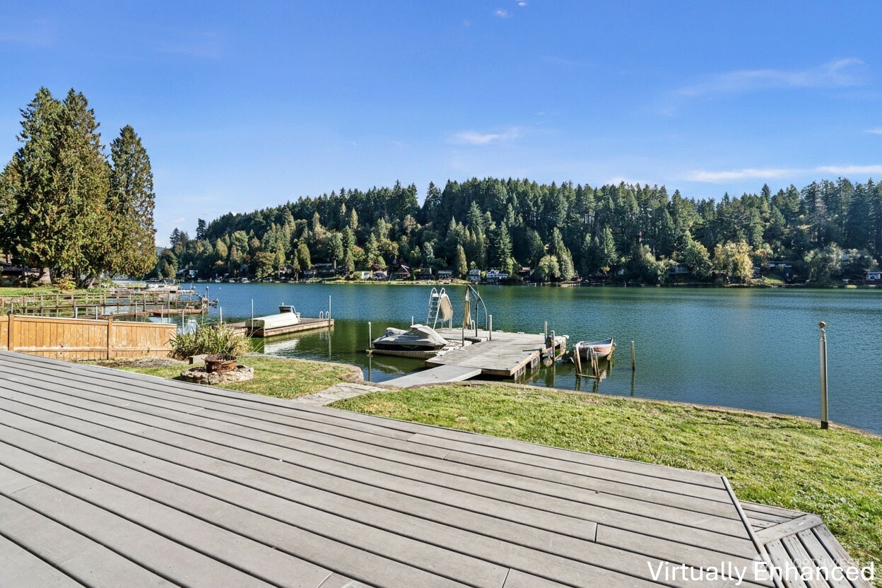 39217 Orville Road East Eatonville, WA 98328 - Photo 4 of 29 a view of a lake with houses