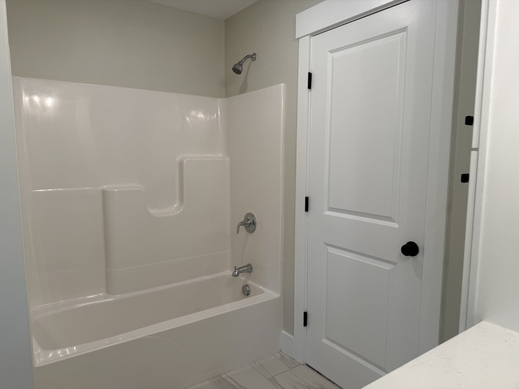 480 Wareham Street, Unit 2 Middleboro, MA 02346 - Photo 13 of 19 a bathroom with a bathtub