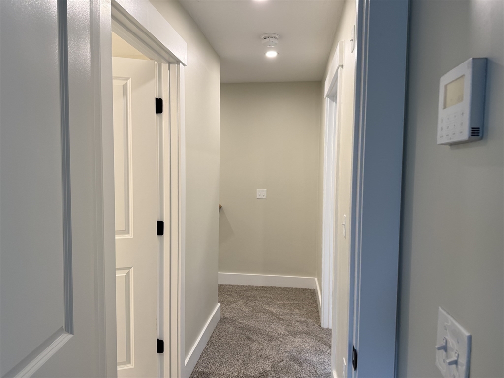 480 Wareham Street, Unit 2 Middleboro, MA 02346 - Photo 15 of 19 a view of hallway with closet and a window